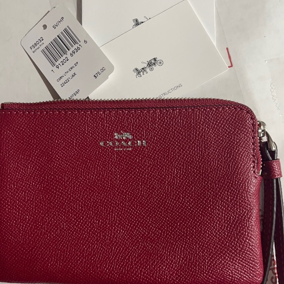Coach Handbags - NEW Coach wristlet zip up